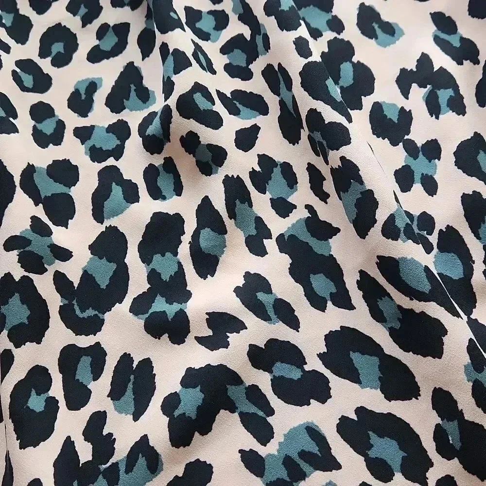 1. State Animal Print High Neck Swing Tank - Picture 2 of 6